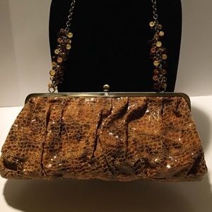 Emma Rose Faux snakeskin purse.